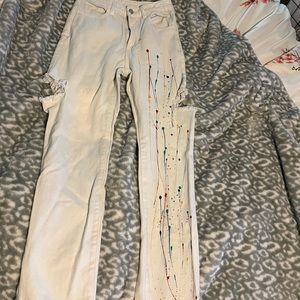 White paint splattered jeans